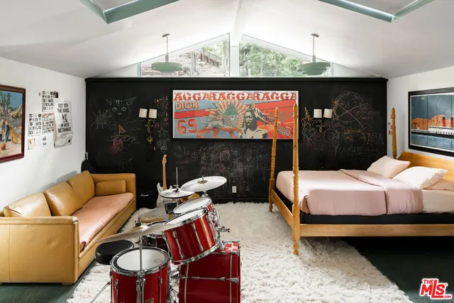 a room with furniture and wooden floor