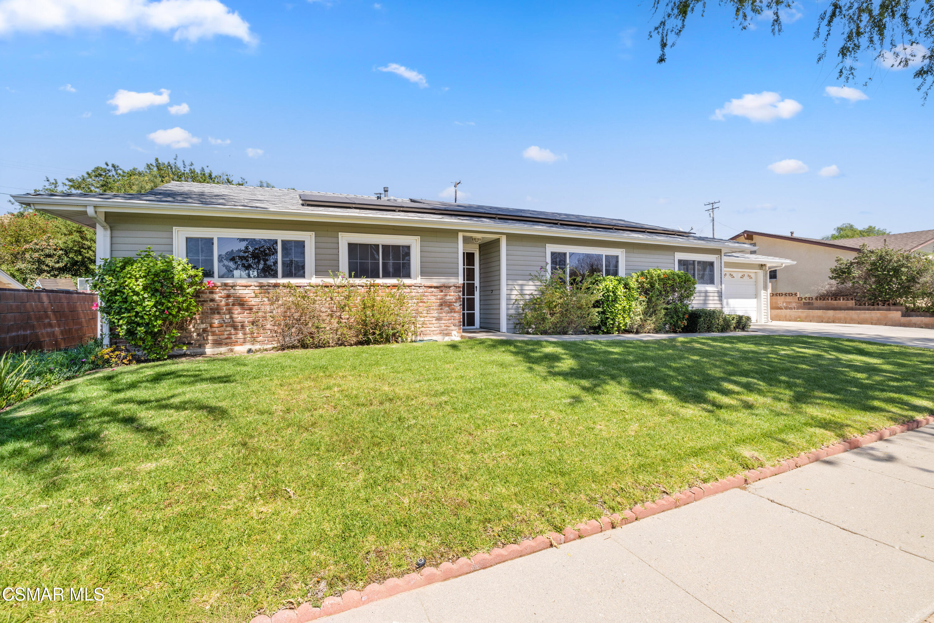 4477 Hempstead Street Simi Valley, CA 93063 - Photo 25 of 25 a front view of house with yard and green space