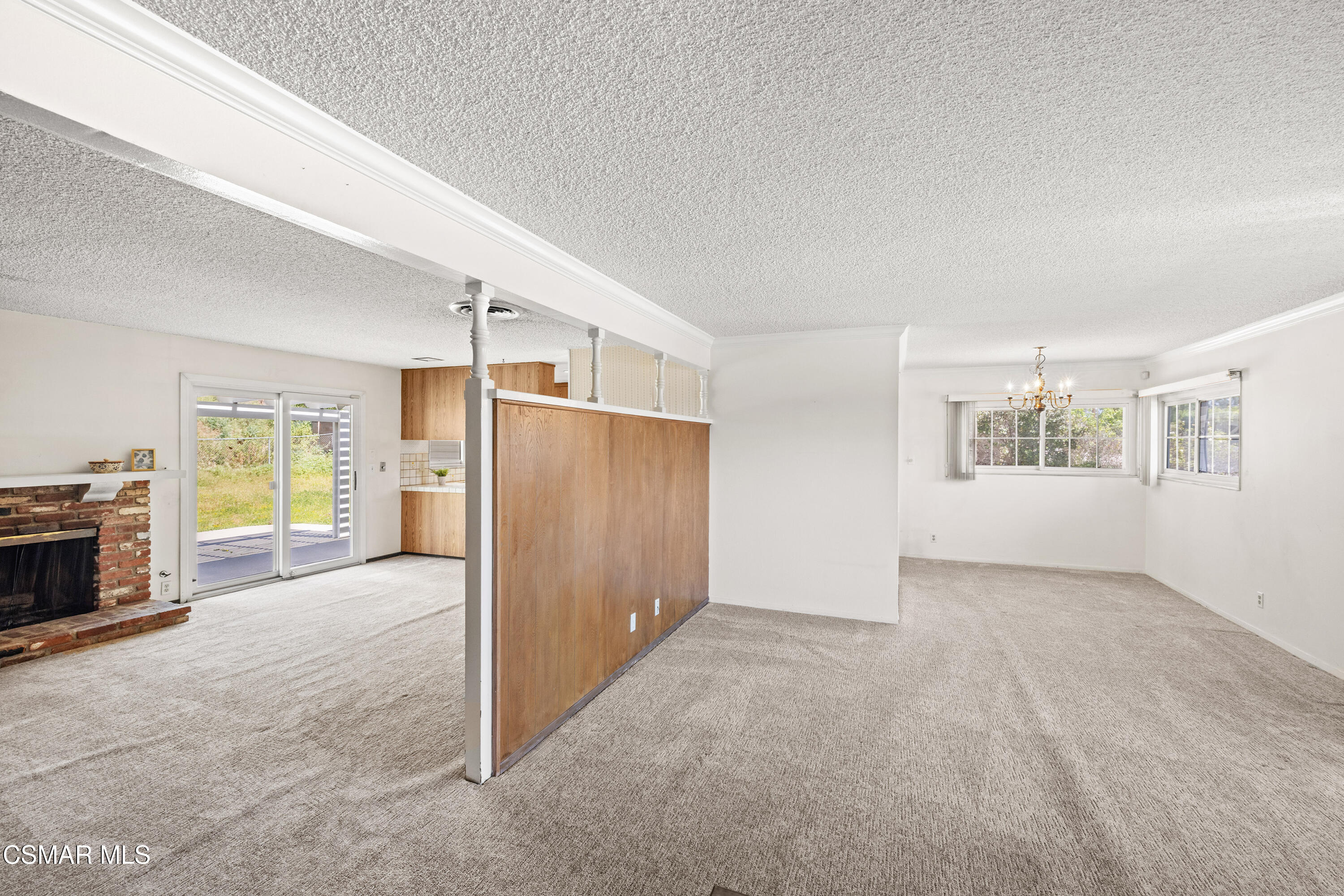 4477 Hempstead Street Simi Valley, CA 93063 - Photo 4 of 25 an empty room with windows and fireplace
