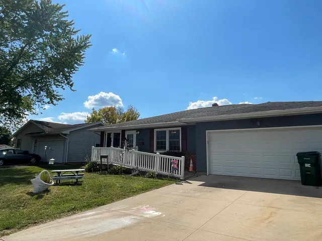 a view of house with yard and entertaining space