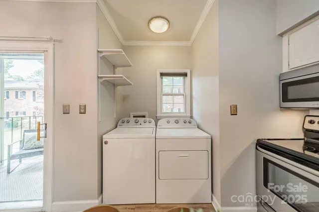 a utility room with dryer and washer
