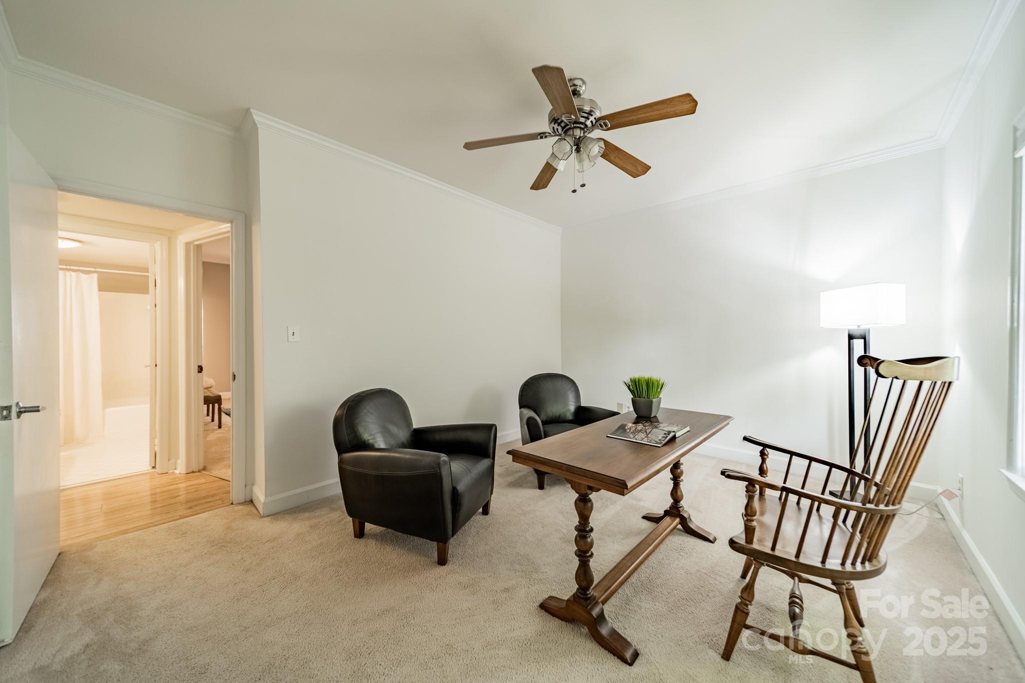 5927 Quail Hollow Road, Unit H Charlotte, NC 28210 - Photo 23 of 45 a view of a workspace with furniture and a window