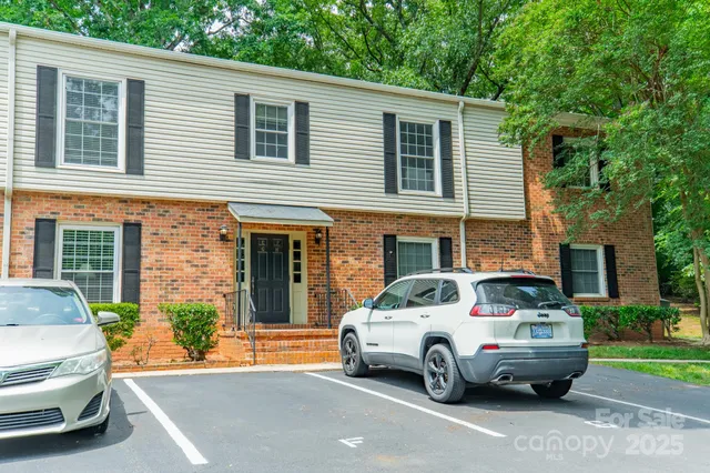 a car parked in front of a house