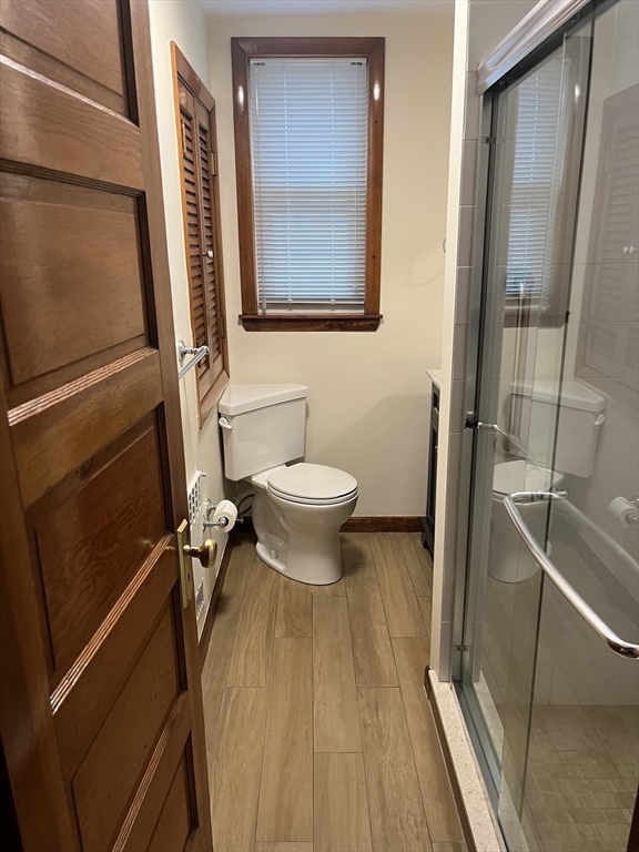 10 Antrim Street, Unit 2 Boston, MA 02128 - Photo 16 of 18 a bathroom with a sink a toilet and shower