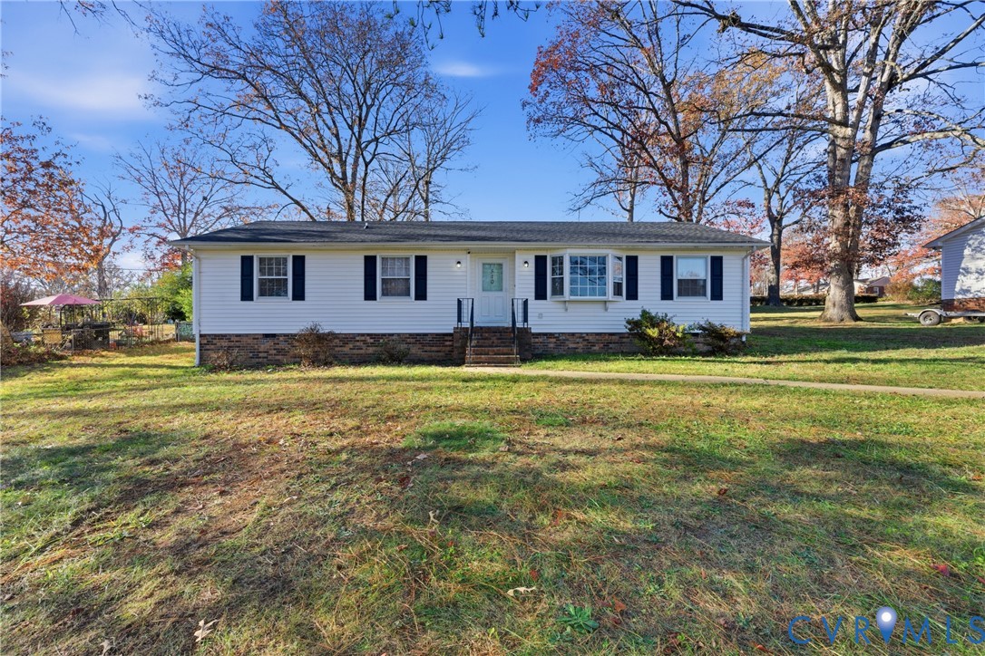 510 Jade Road North Chesterfield, VA 23236 - Photo 1 of 27 a front view of a house with a garden