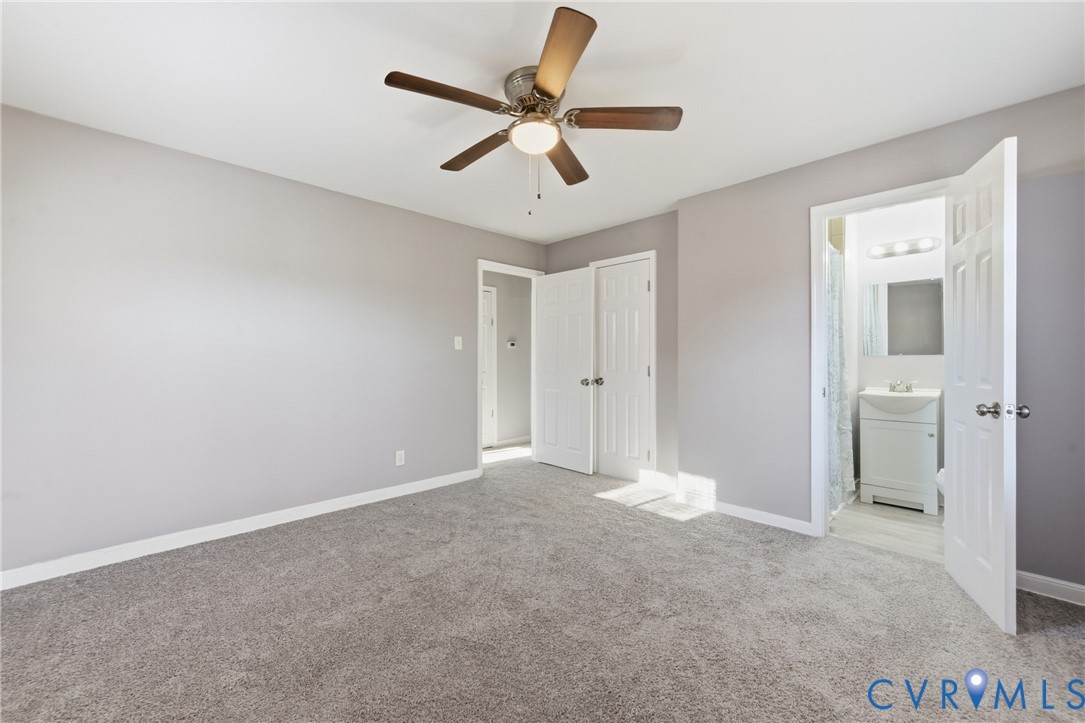 510 Jade Road North Chesterfield, VA 23236 - Photo 13 of 27 a view of an empty room and a ceiling fan