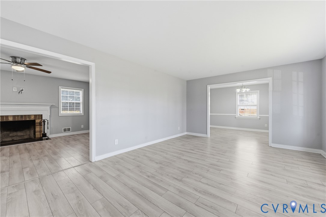 510 Jade Road North Chesterfield, VA 23236 - Photo 4 of 27 a view of empty room with wooden floor and fireplace