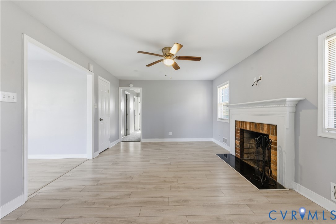 510 Jade Road North Chesterfield, VA 23236 - Photo 6 of 27 a view of empty room with fireplace and fan