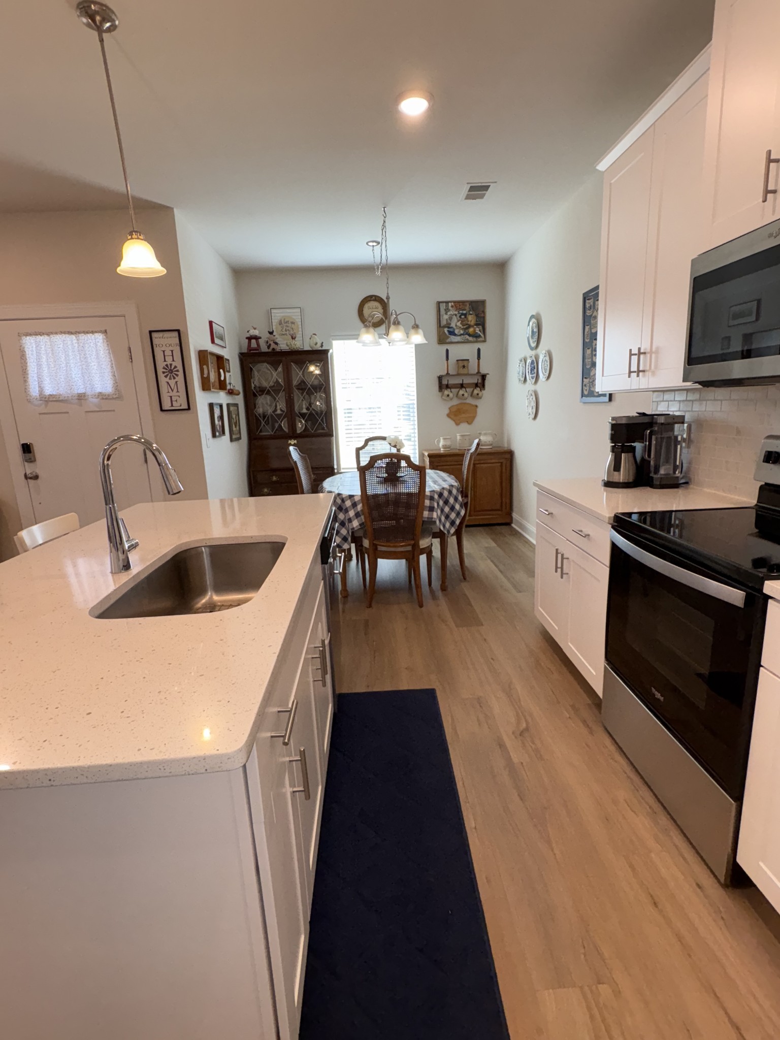 672 Taylor Bend Columbia, TN 38401 - Photo 12 of 32 a kitchen with granite countertop a sink a counter top space stainless steel appliances and cabinets