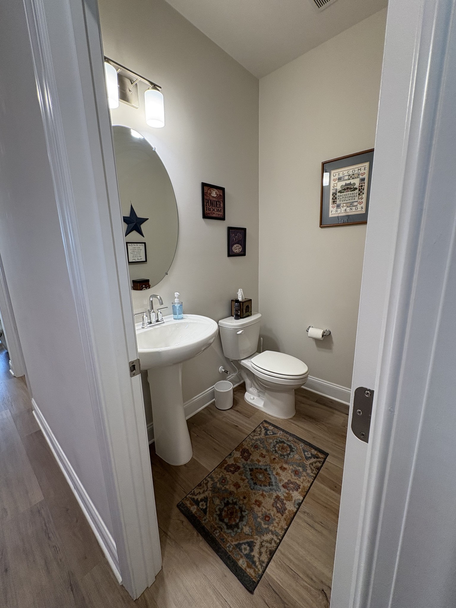 672 Taylor Bend Columbia, TN 38401 - Photo 18 of 32 a bathroom with a sink and a mirror