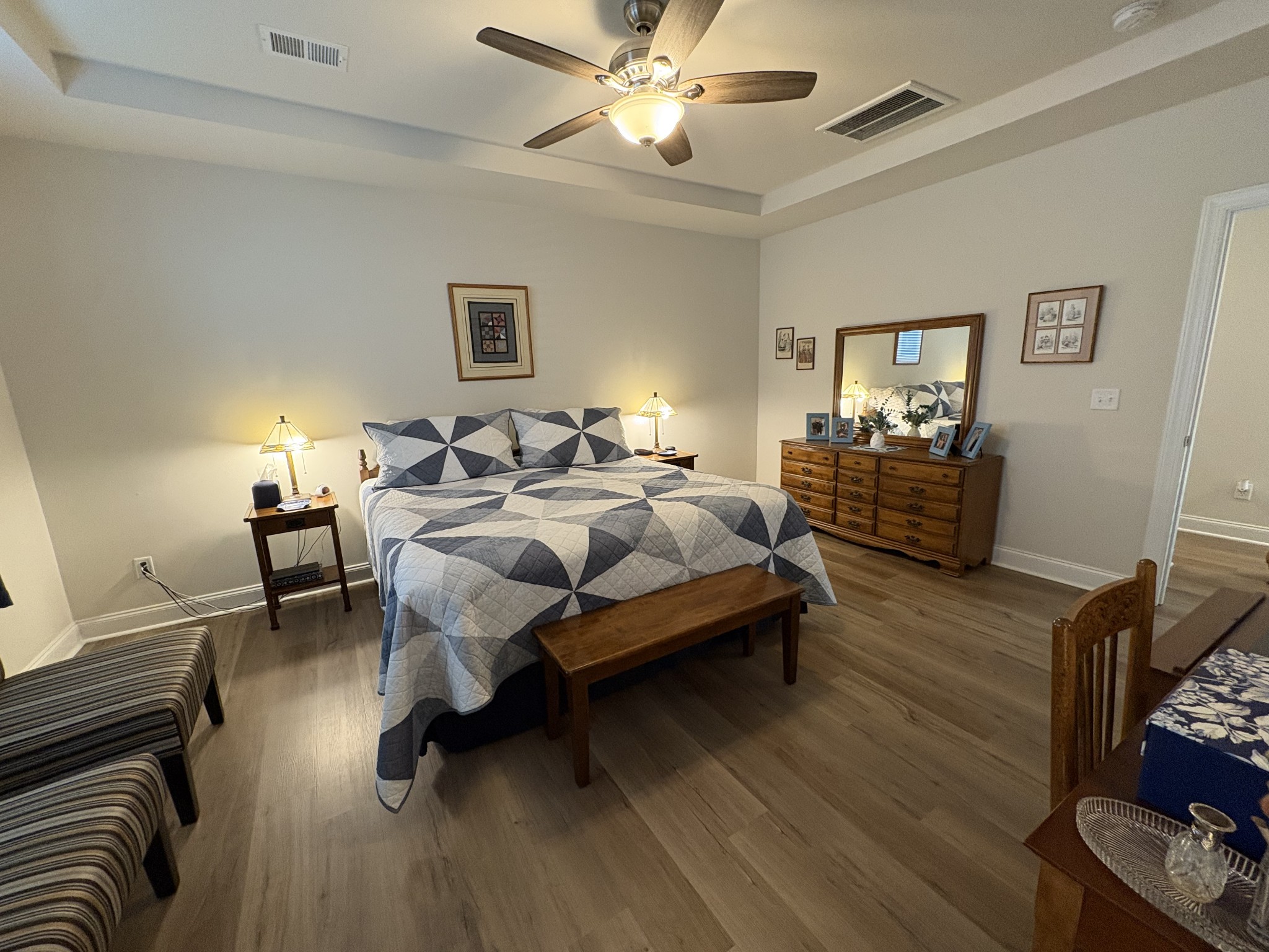 672 Taylor Bend Columbia, TN 38401 - Photo 19 of 32 a bedroom with a bed and wooden floor