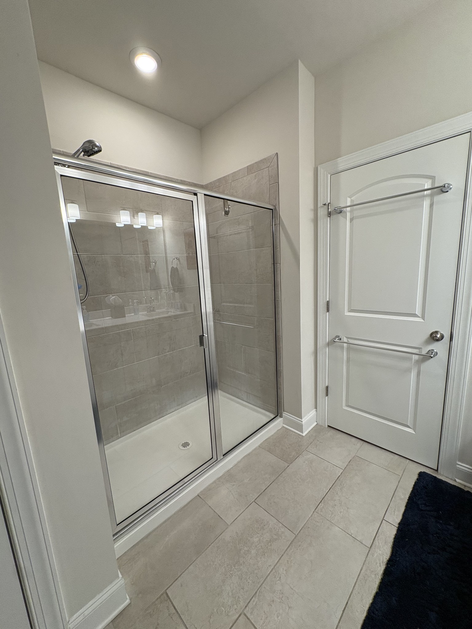 672 Taylor Bend Columbia, TN 38401 - Photo 22 of 32 a bathroom with a glass shower door