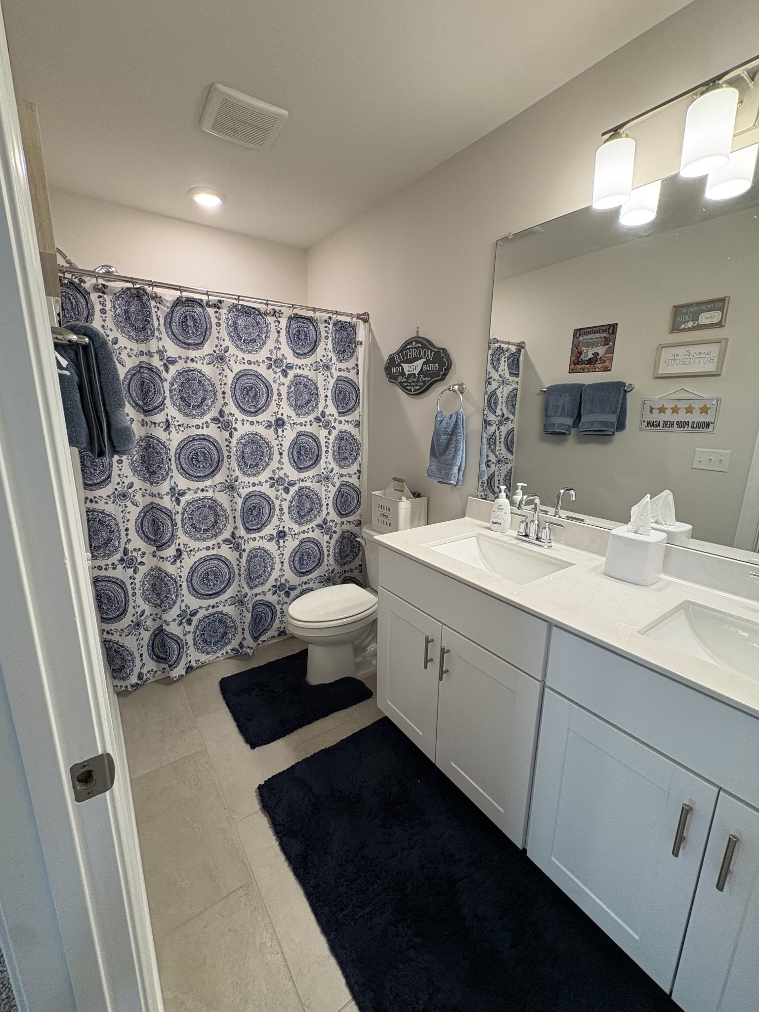 672 Taylor Bend Columbia, TN 38401 - Photo 30 of 32 a bathroom with a double vanity sink mirror and toilet