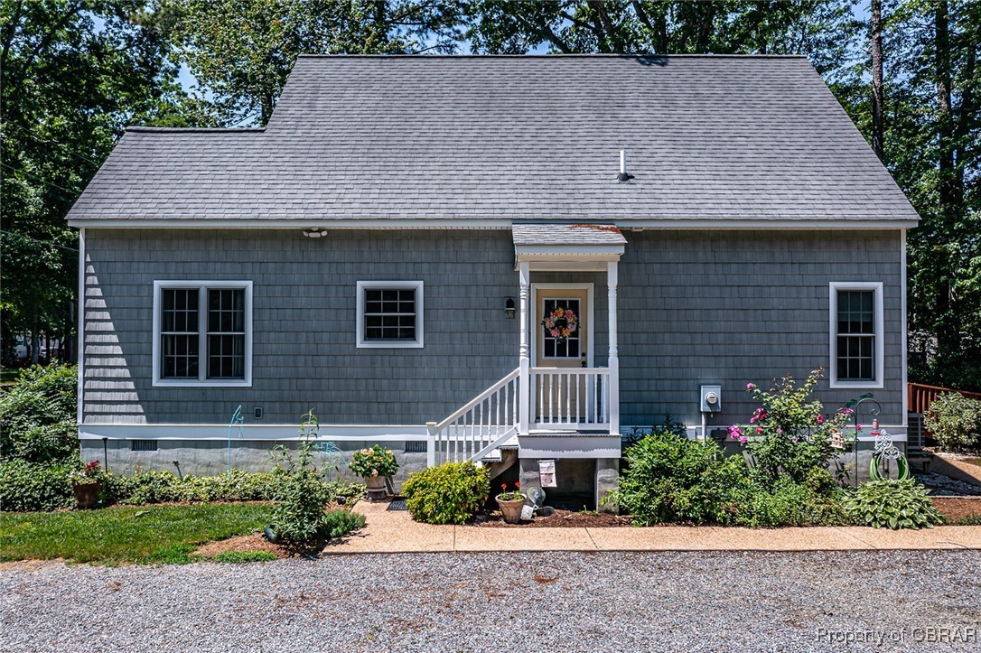 189 Virginia Road Reedville, VA 22539 - Photo 3 of 46 View of front facade featuring a shingled roof