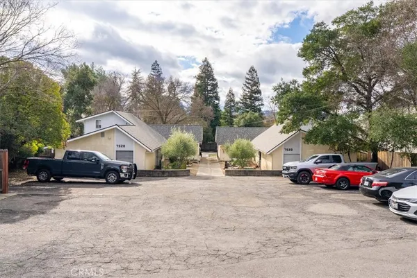 a car parked in front of a house
