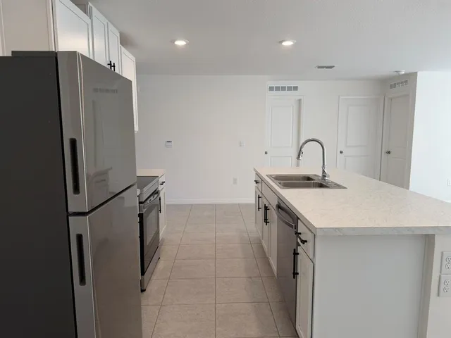 an empty room with windows