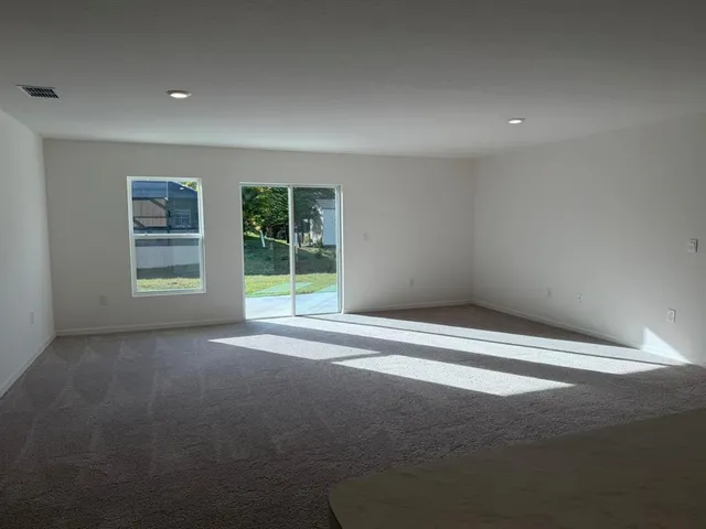 a view of storage and utility room with washer and dryer