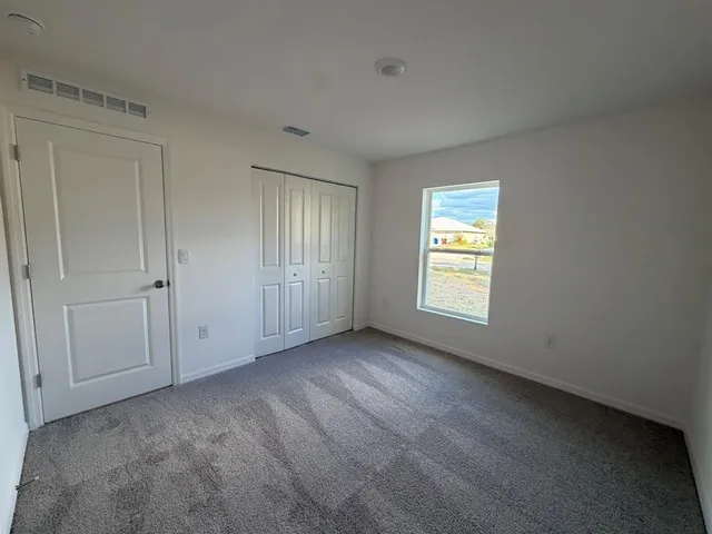 a bathroom with a sink toilet and vanity
