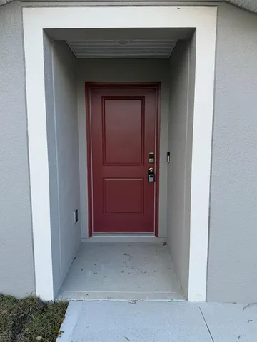 a kitchen with stainless steel appliances a sink stove and cabinets