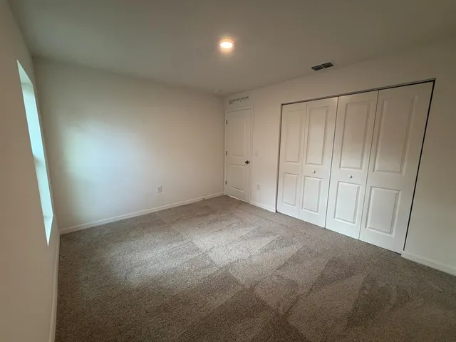 a house view with a backyard space