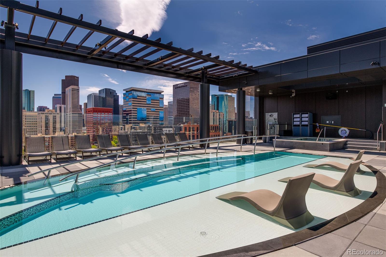 1901 Wazee Street, Unit 704 Denver, CO 80202 - Photo 1 of 49 a view of swimming pool with outdoor seating