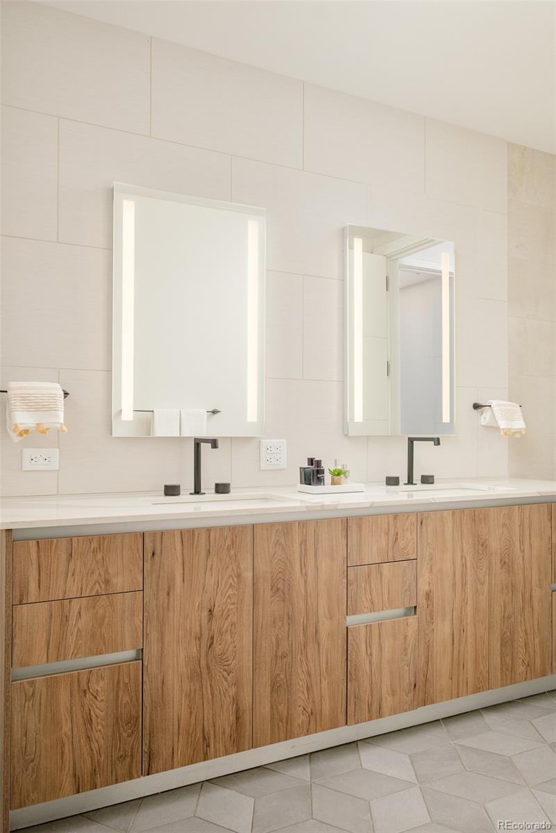 1901 Wazee Street, Unit 704 Denver, CO 80202 - Photo 18 of 49 a bathroom with a sink and a mirror