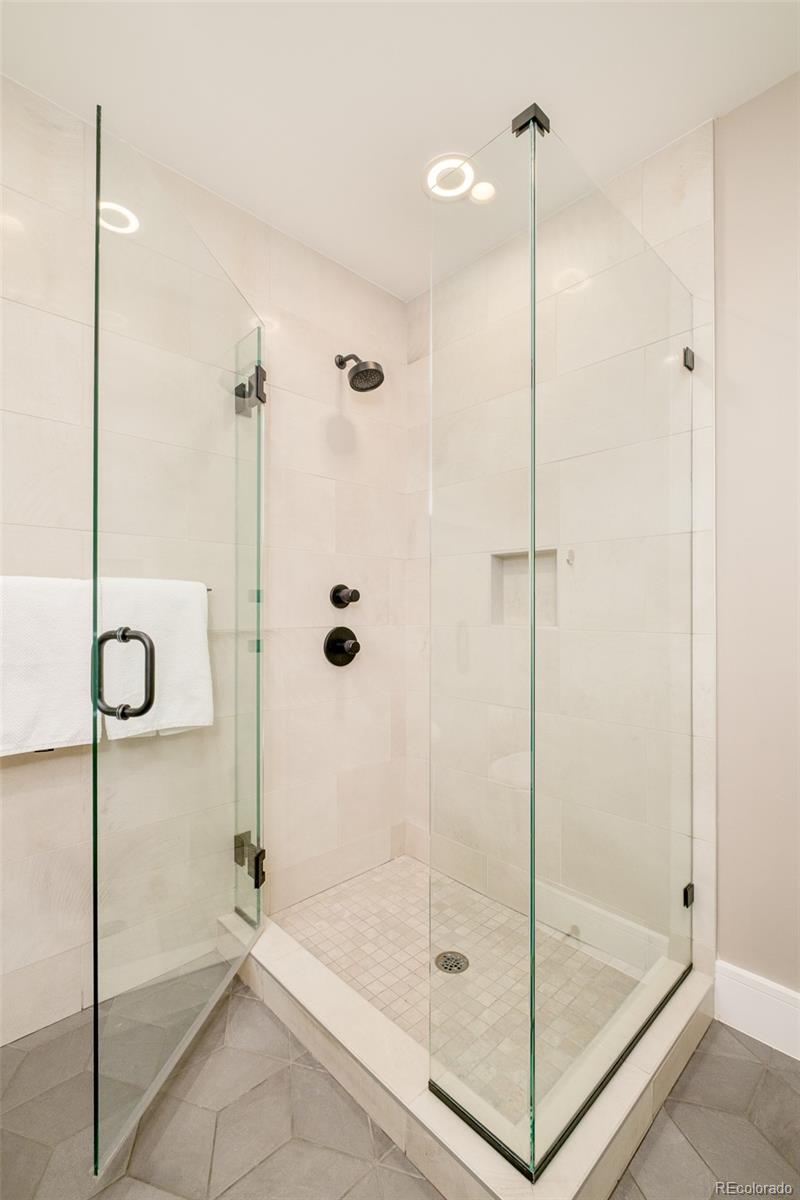 1901 Wazee Street, Unit 704 Denver, CO 80202 - Photo 26 of 49 a bathroom with a shower
