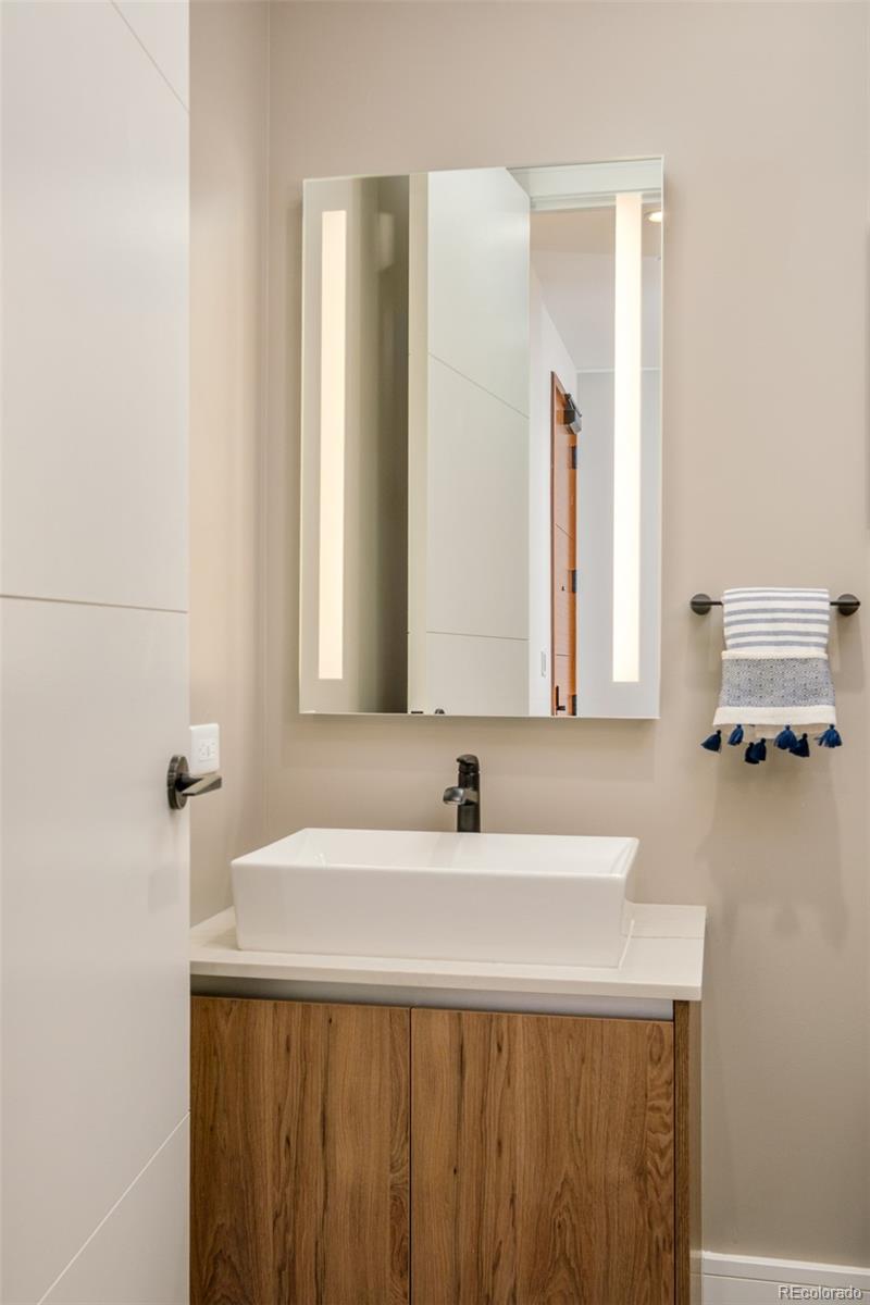 1901 Wazee Street, Unit 704 Denver, CO 80202 - Photo 27 of 49 a bathroom with a sink and a mirror