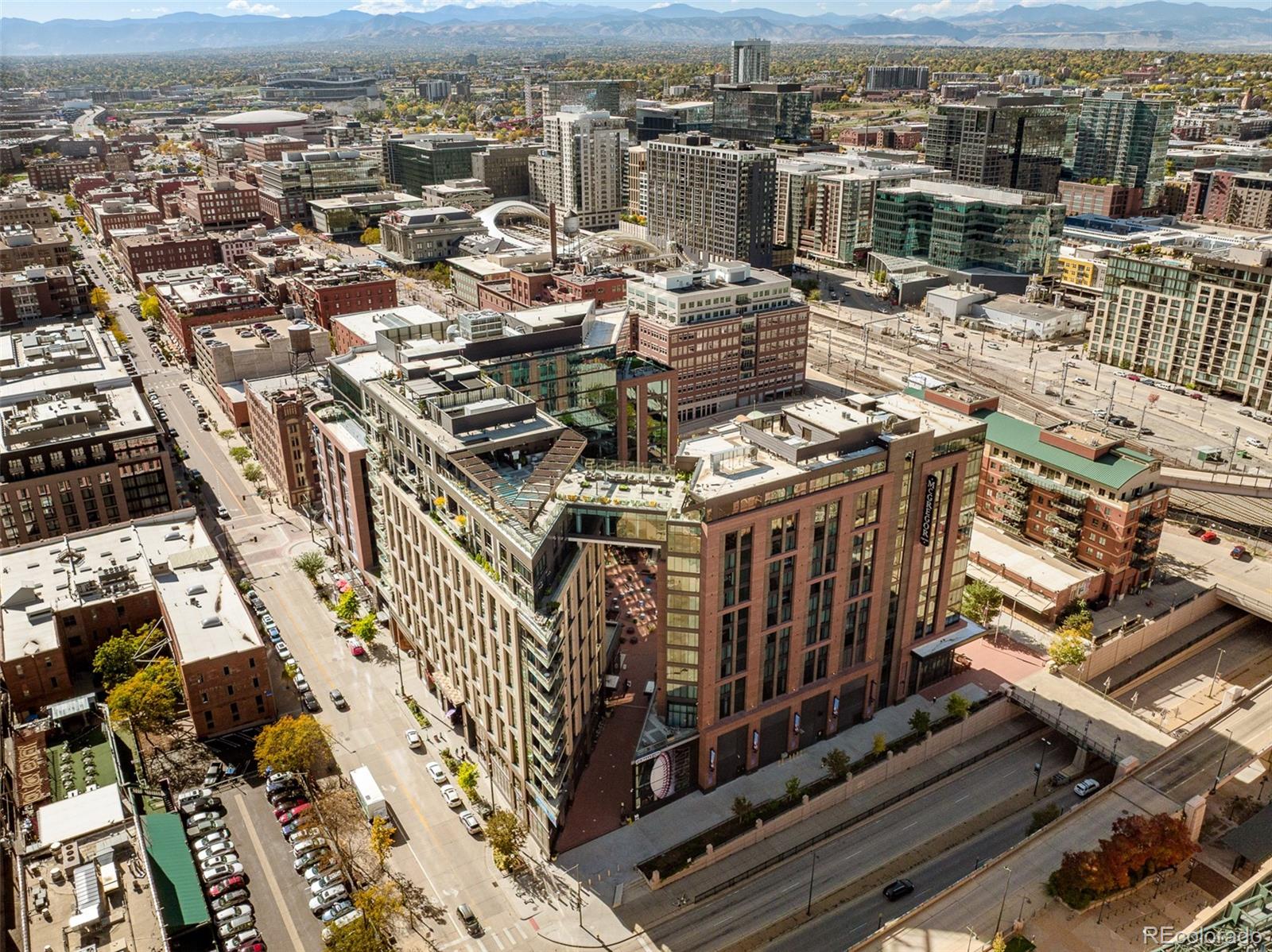 1901 Wazee Street, Unit 704 Denver, CO 80202 - Photo 32 of 49 an aerial view of a building with parking