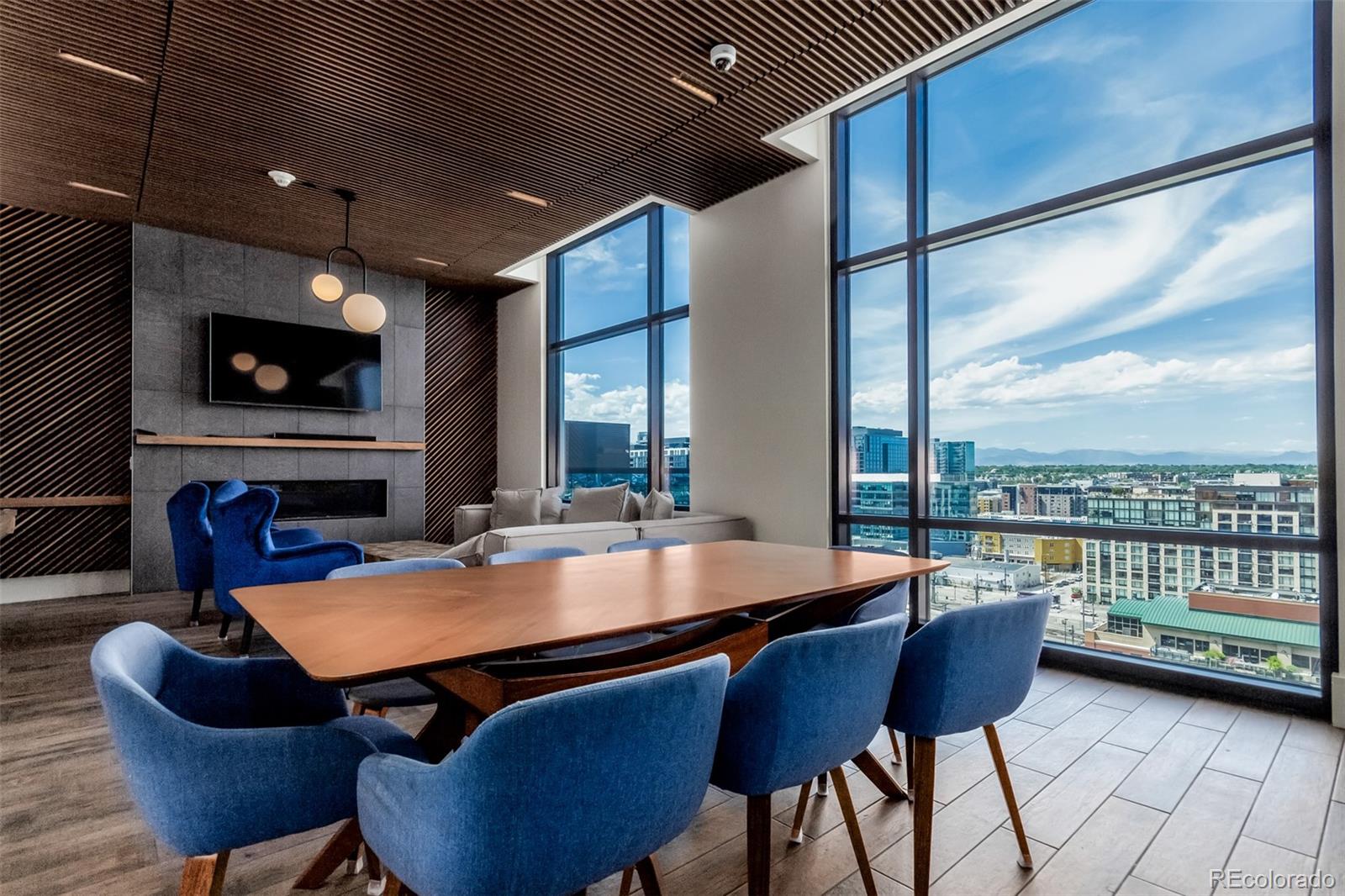 1901 Wazee Street, Unit 704 Denver, CO 80202 - Photo 43 of 49 a dining room with furniture window and wooden floor