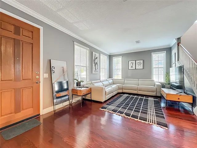 a outdoor living space with furniture and wooden floor