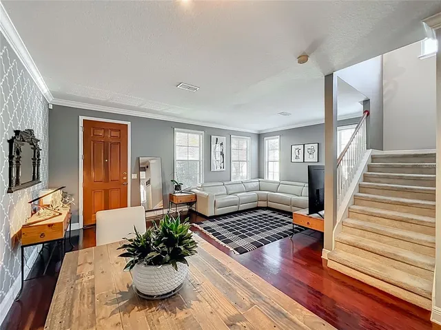 a living room with furniture and a window