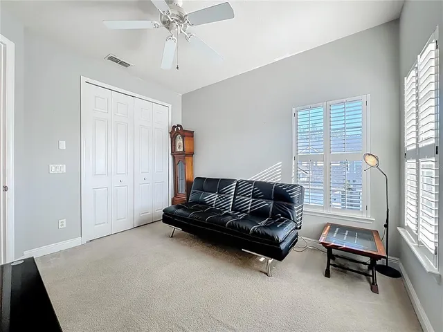 a living room with furniture and a window