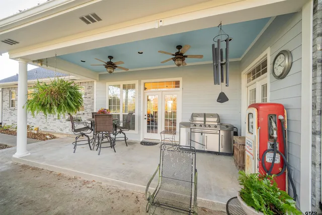 an outdoor space with furniture