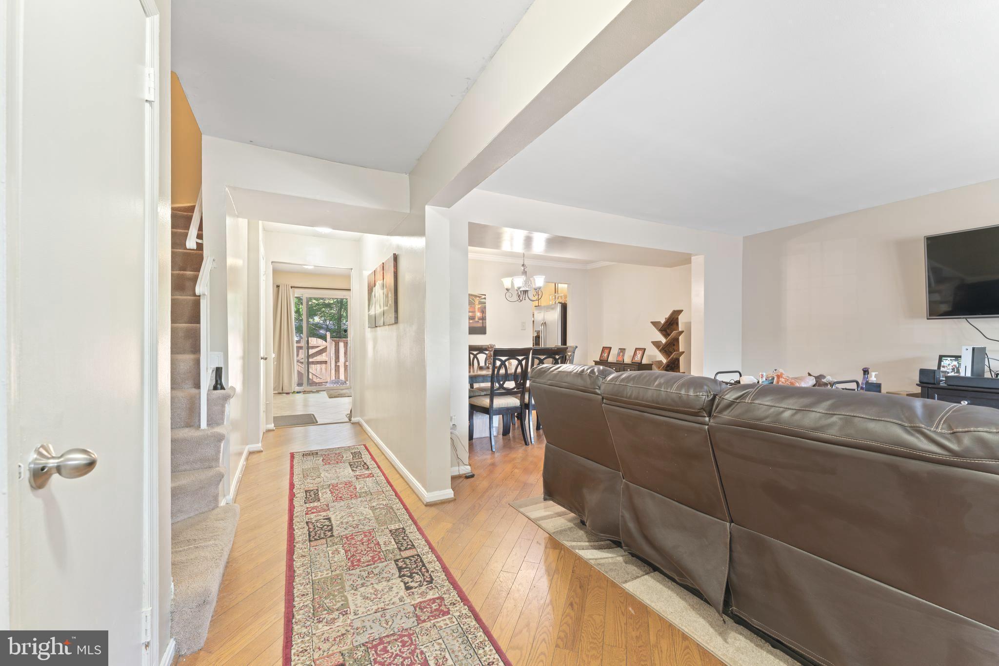 8054 Powderbrook Lane Springfield, VA 22153 - Photo 7 of 29 Foyer with hardwood floors