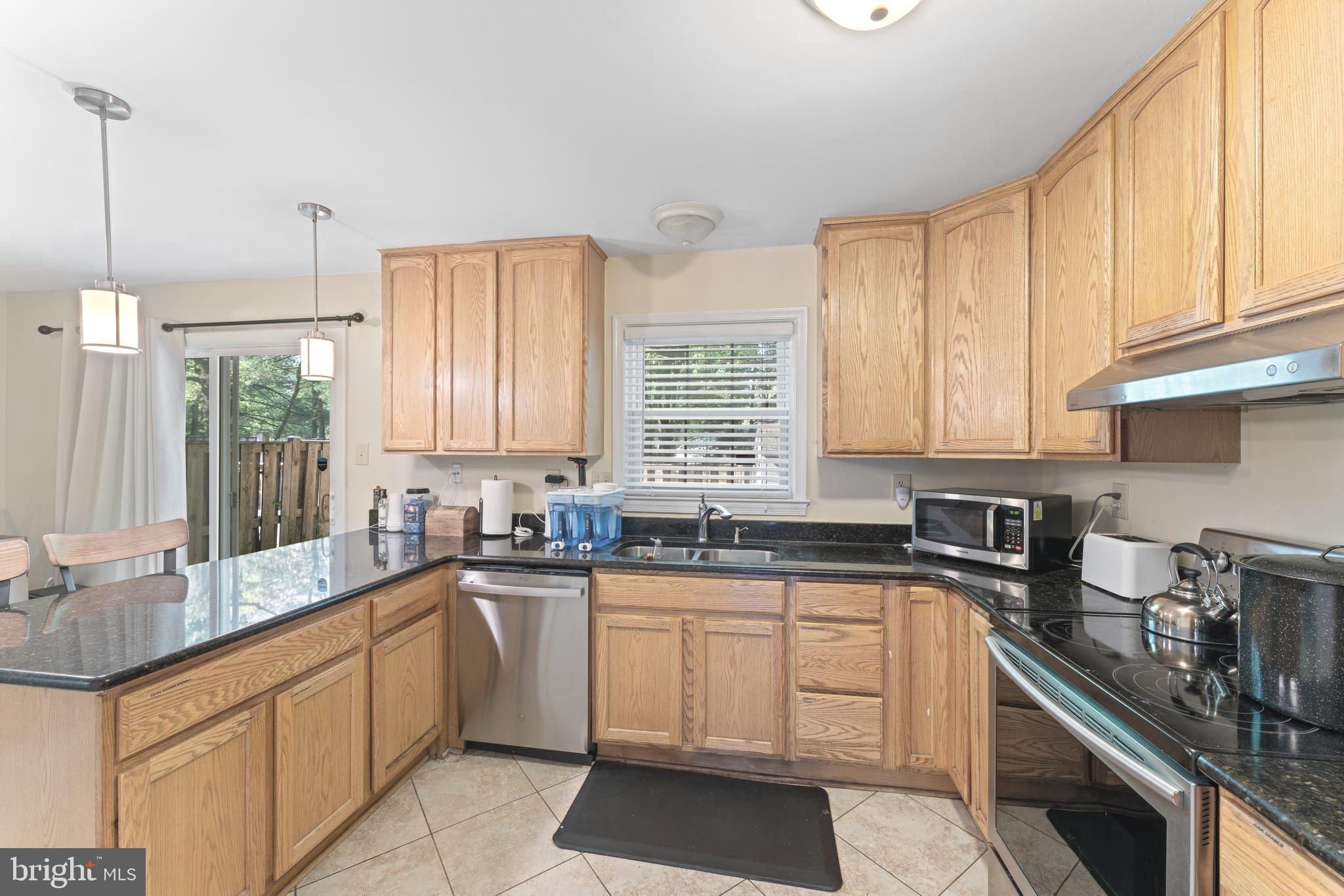 8054 Powderbrook Lane Springfield, VA 22153 - Photo 10 of 29 Kitchen with 42 in cabinets.