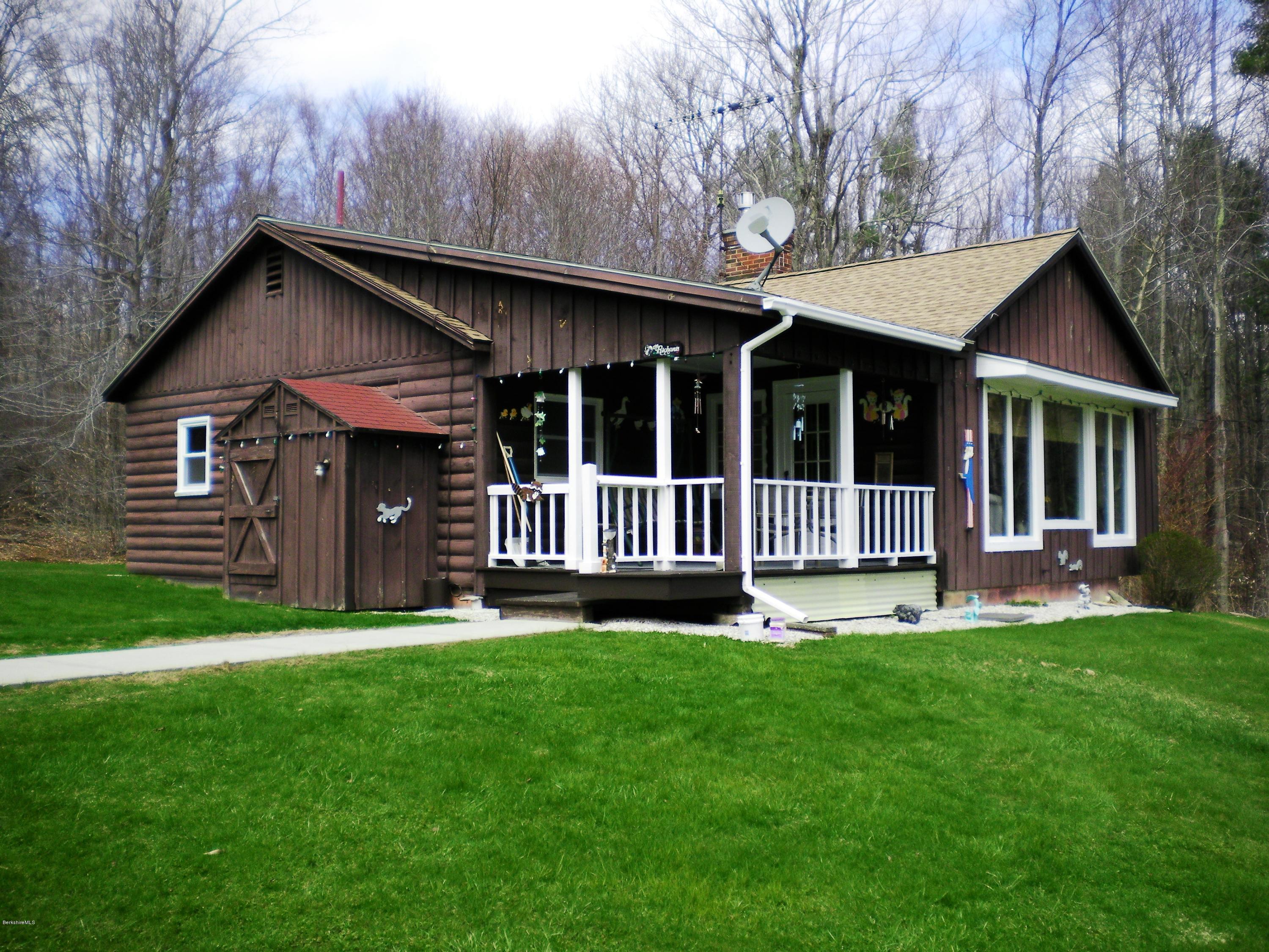 104 Middlefield Road Peru, MA 01235 - Photo 1 of 29 a view of a house with a yard and large tree