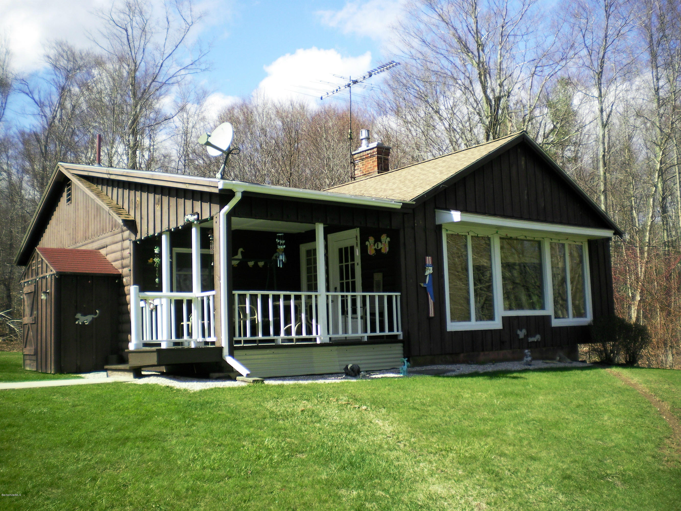 104 Middlefield Road Peru, MA 01235 - Photo 2 of 29 a view of a house with a yard and large window