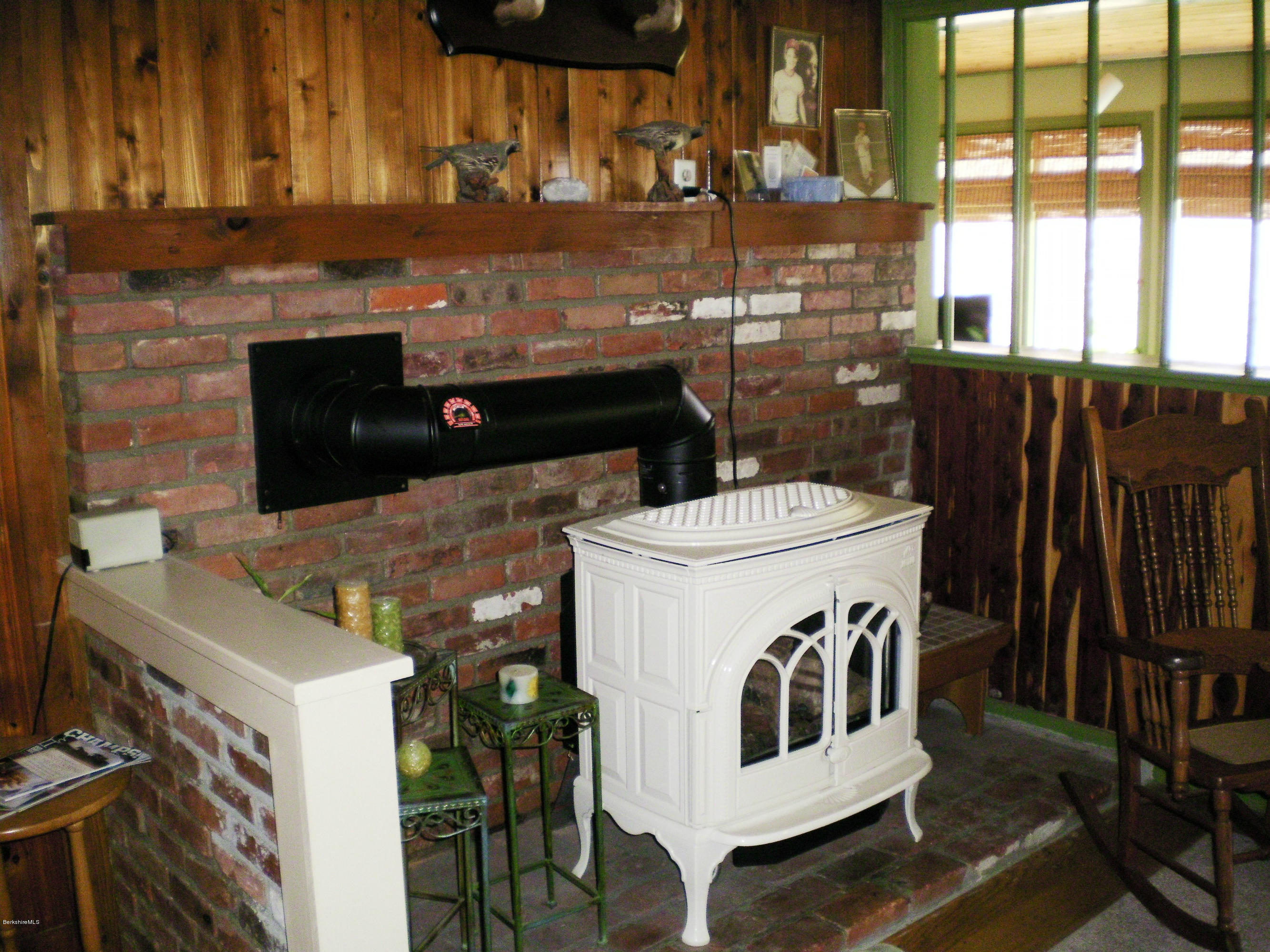 104 Middlefield Road Peru, MA 01235 - Photo 20 of 29 a view of washer and dryer with wooden walls