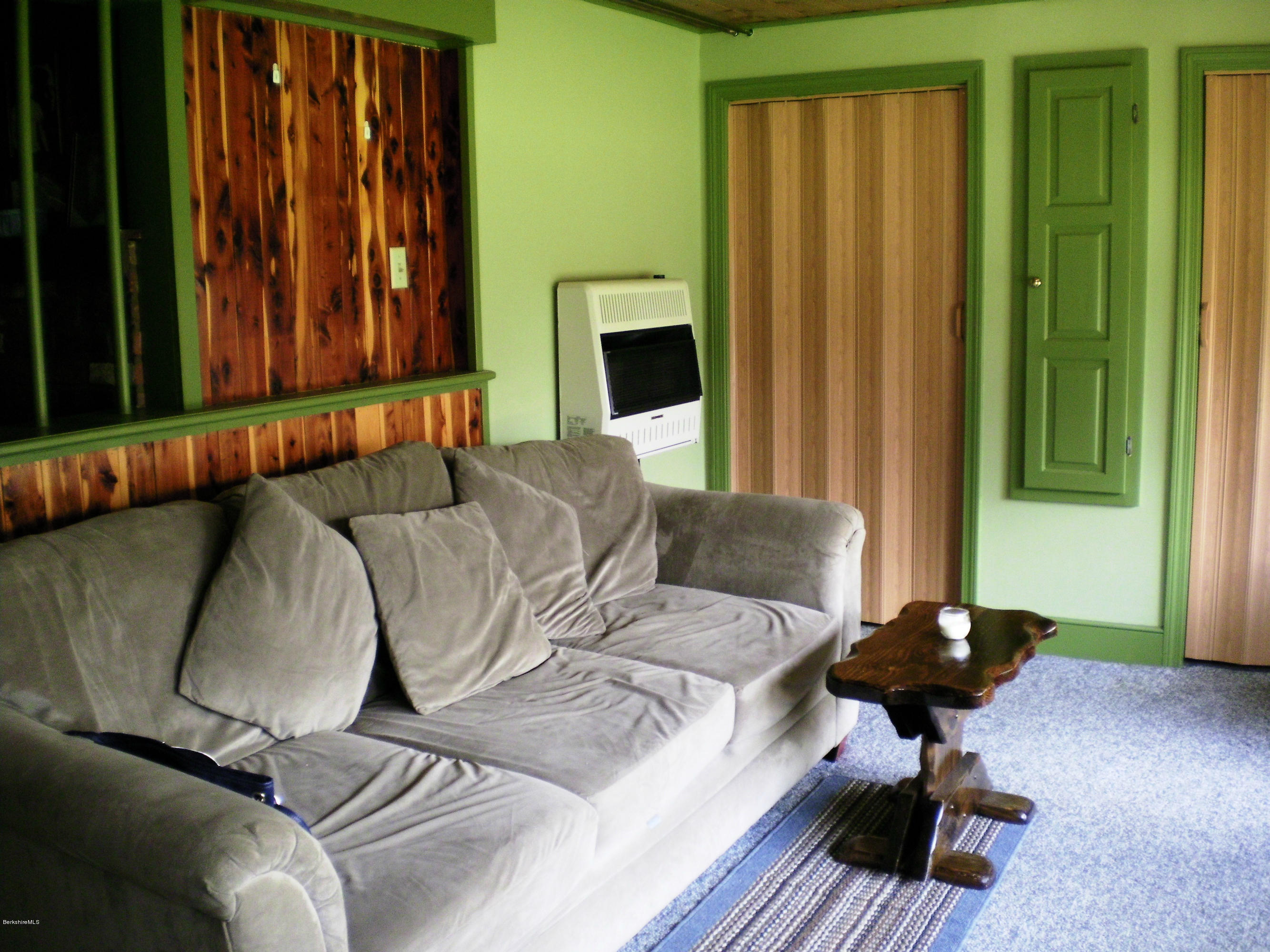 104 Middlefield Road Peru, MA 01235 - Photo 25 of 29 a living room with furniture and a window