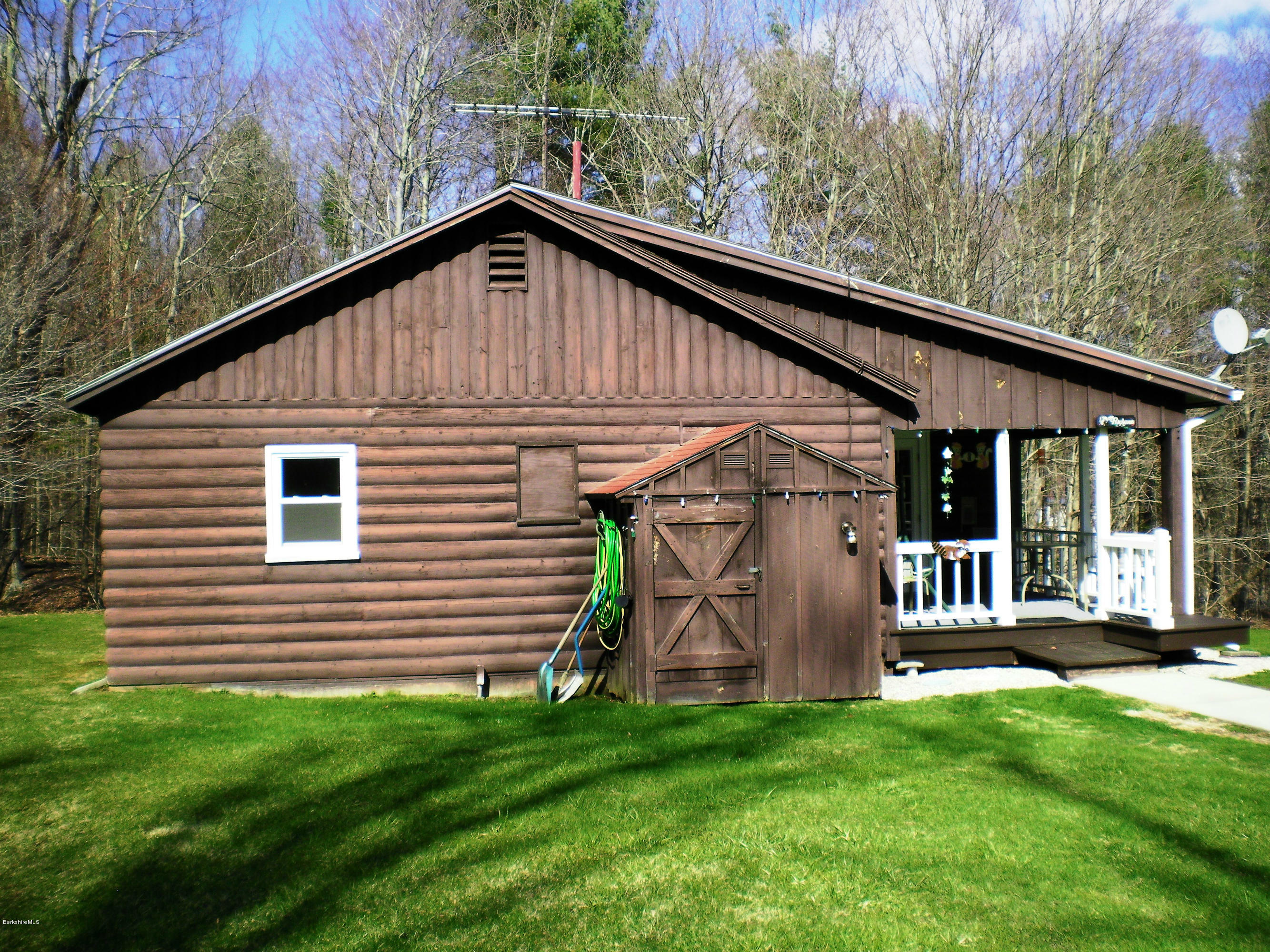 104 Middlefield Road Peru, MA 01235 - Photo 6 of 29 a view of a house with a yard