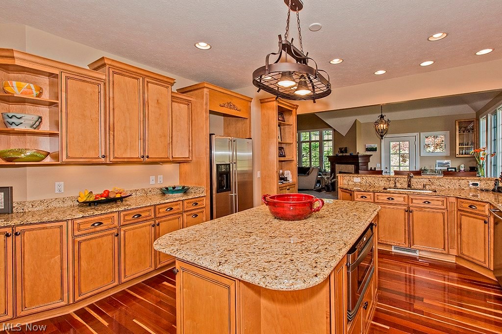 3375 Legends Way Cleveland, OH 44124 - Photo 10 of 33 Enormous Gourmet Kitchen with Granite, Huge Island, Breakfast Bar & Top of the Line Stainless Steel Appliances