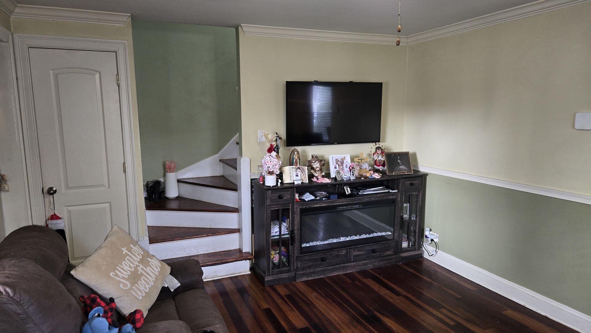 3352 West 84th Street Chicago, IL 60652 - Photo 7 of 26 a living room with furniture and a flat screen tv