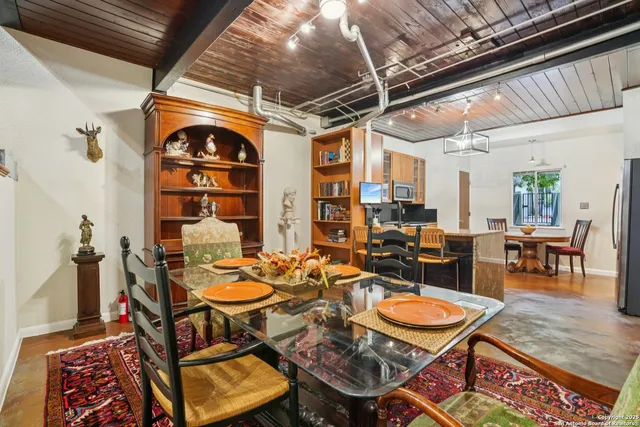 a outdoor dining area with furniture