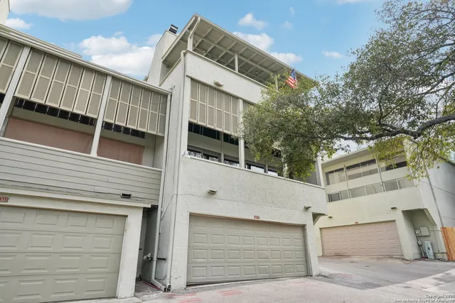 a view of a house with a garage