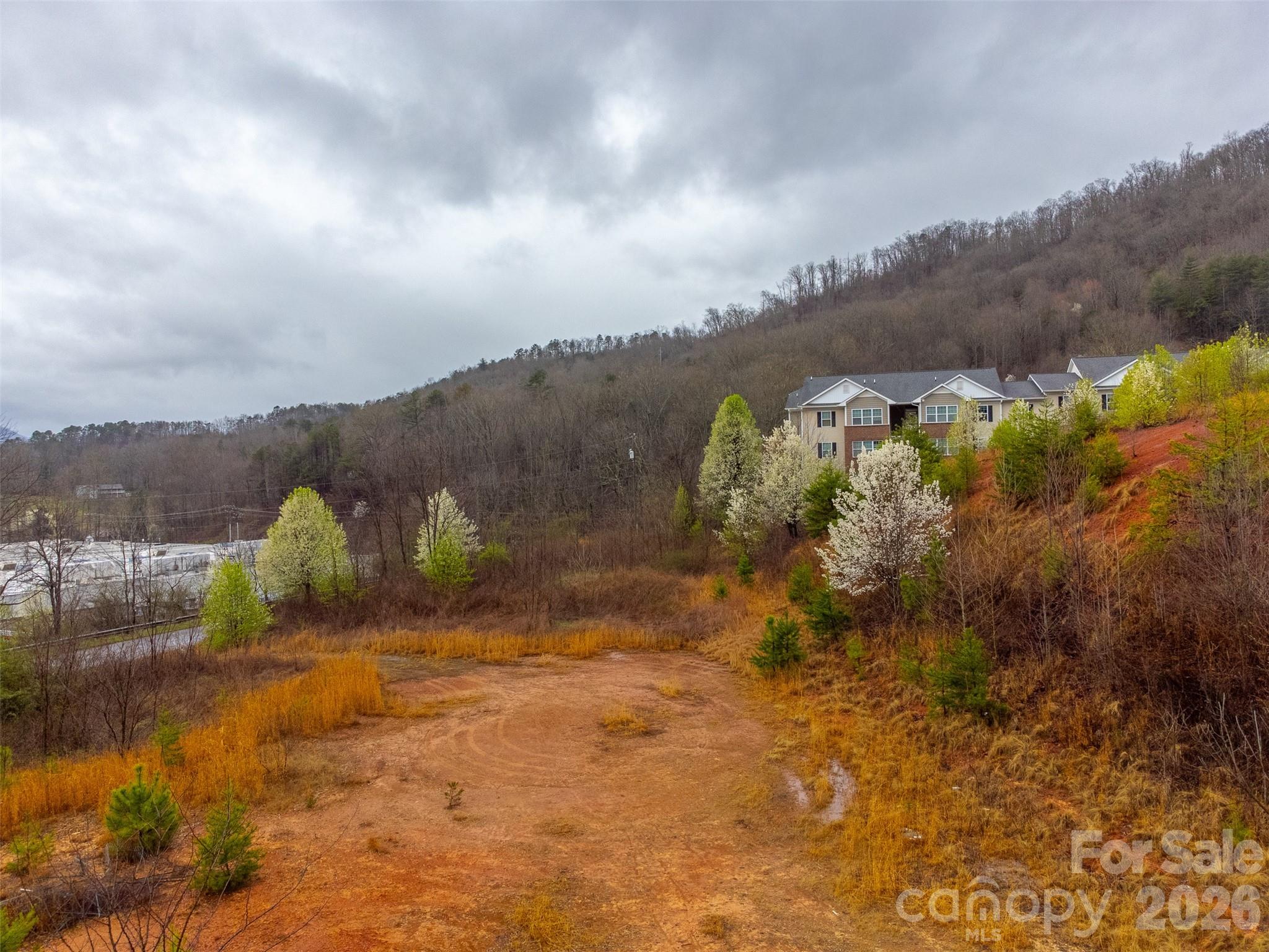 0 Connor Road Sylva, NC 28779 - Photo 12 of 22 a view of a lake with mountains in the background