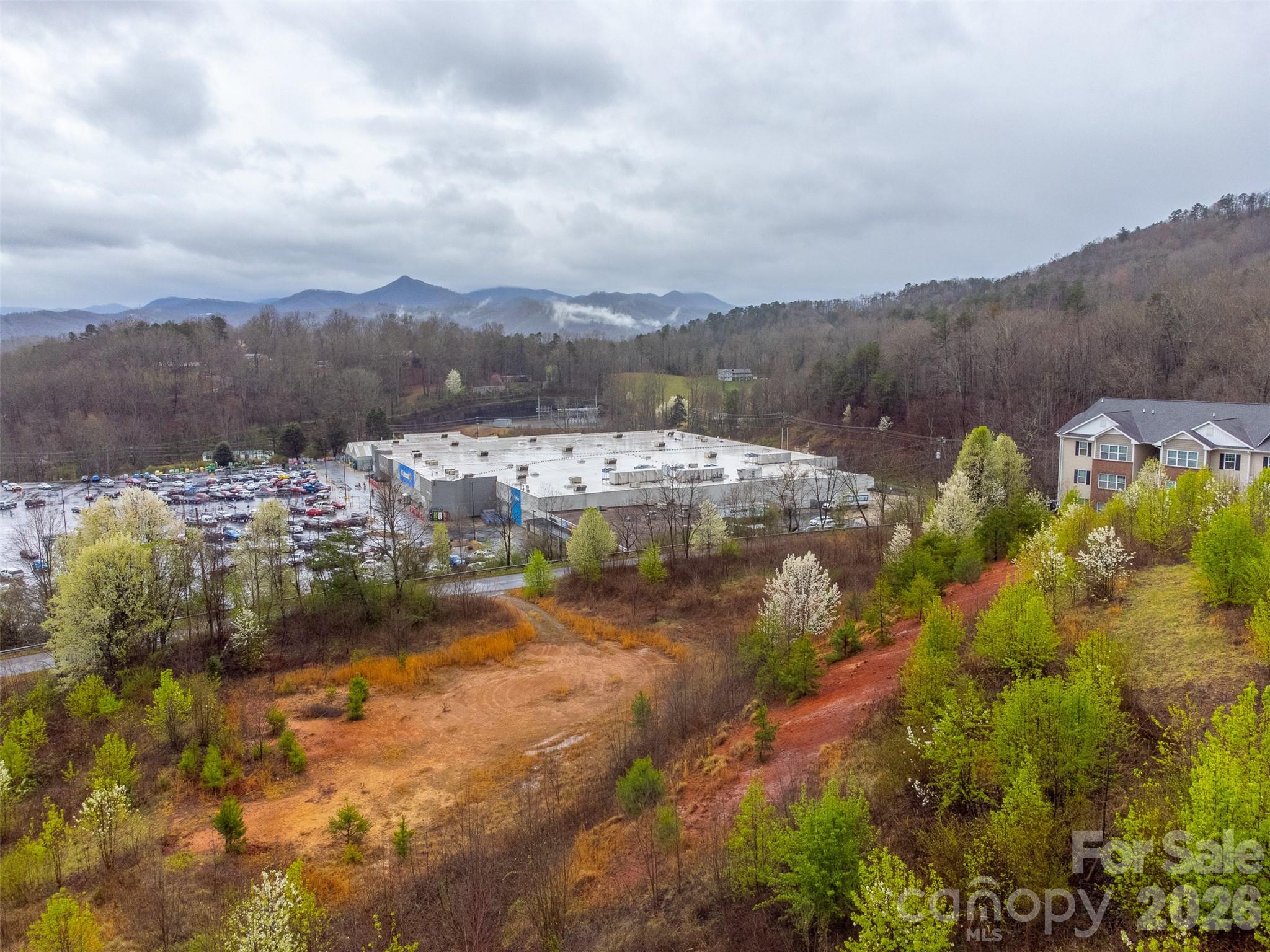 0 Connor Road Sylva, NC 28779 - Photo 16 of 22 a view of a lake with mountains in the background