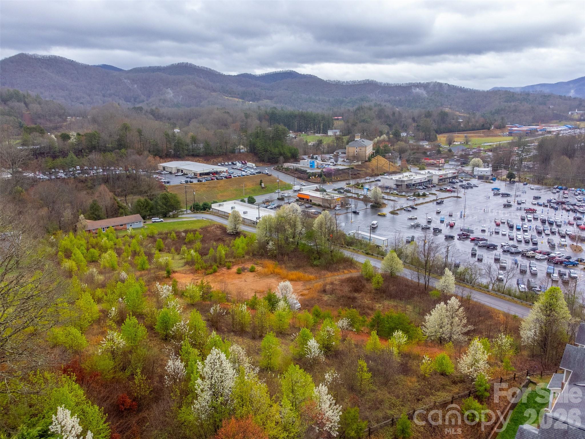 0 Connor Road Sylva, NC 28779 - Photo 20 of 22 a view of a city with mountains in the background