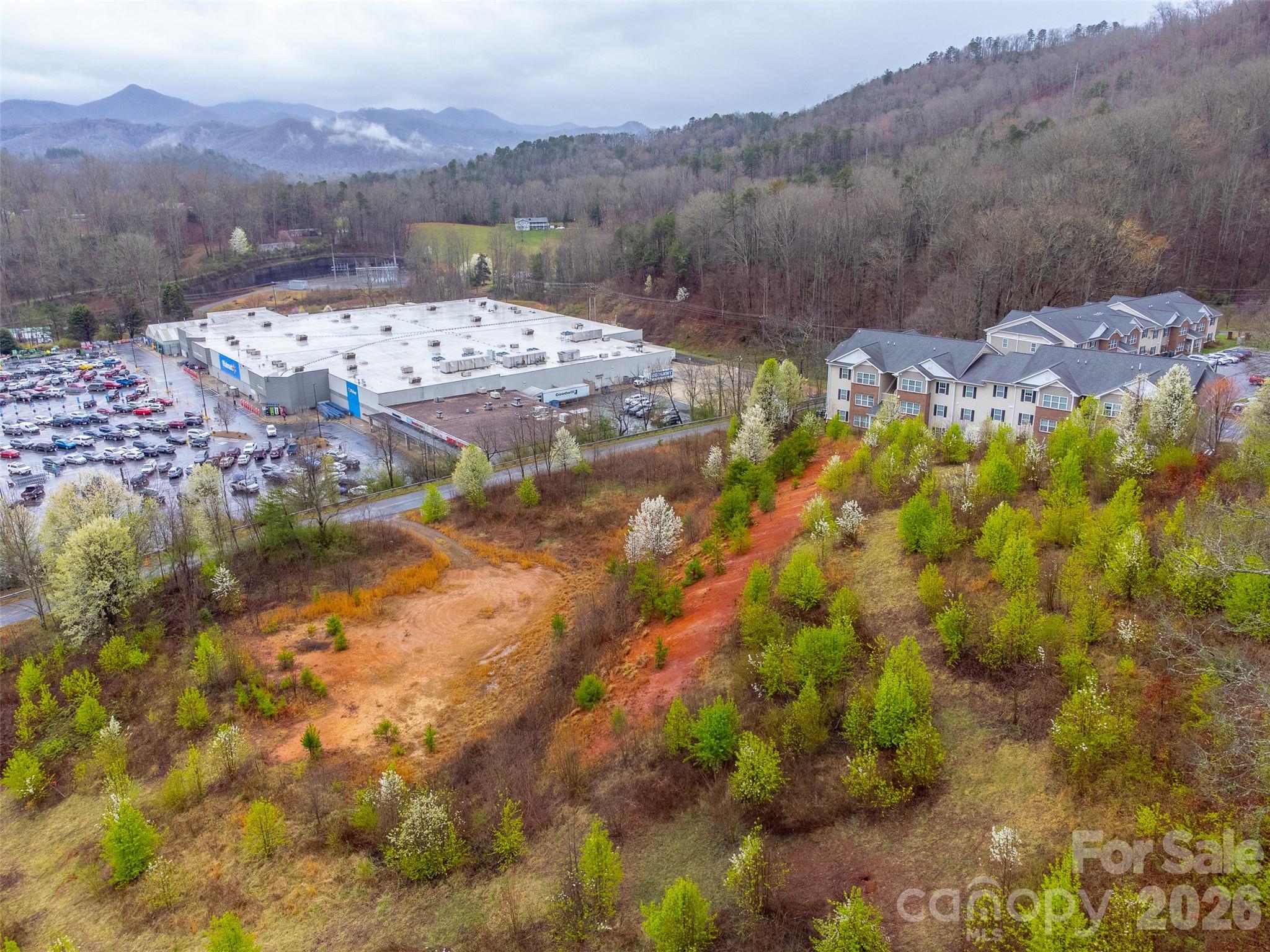 0 Connor Road Sylva, NC 28779 - Photo 21 of 22 a view of a lake with a mountain