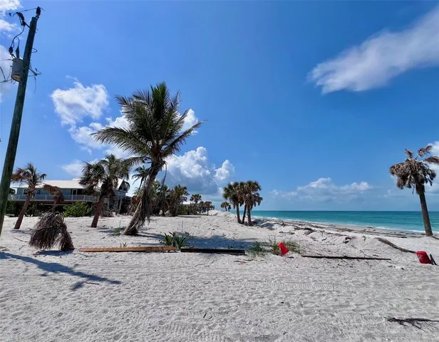 a view of a backyard of the house